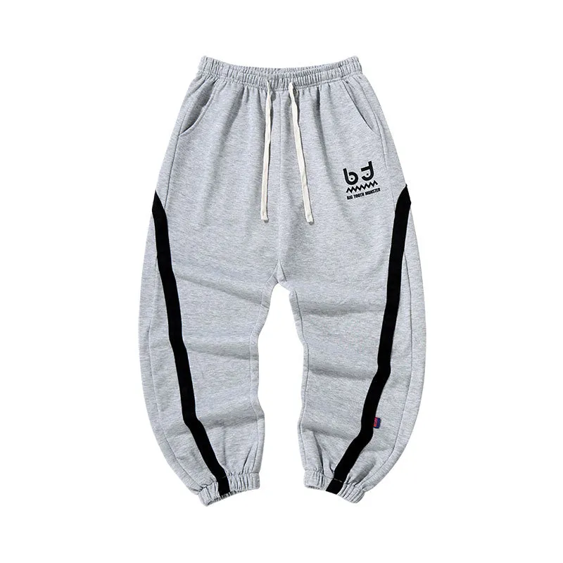 Simple casual style striped ribbon print loose leg drawstring sports pants